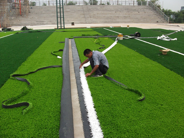 Artificial turf filling particles